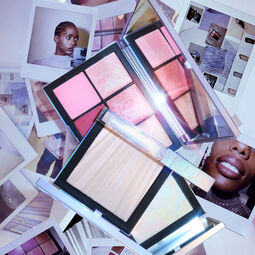 AURA ILLUMINATING FACE & BODY POWDER