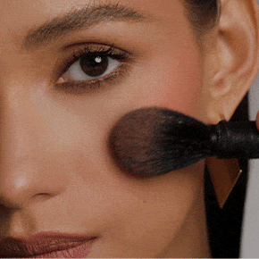 Apply PARAMOUNT to the apples of the cheek and blend upward.